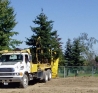 Our 90 inch tree spade hard at work!